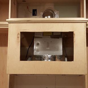 Thermador insert Rangehood with inlet blower.