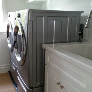 washer dryer with metal drain pan installed