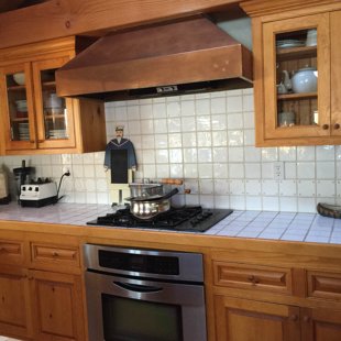 before counter cuts to fit free standing stove