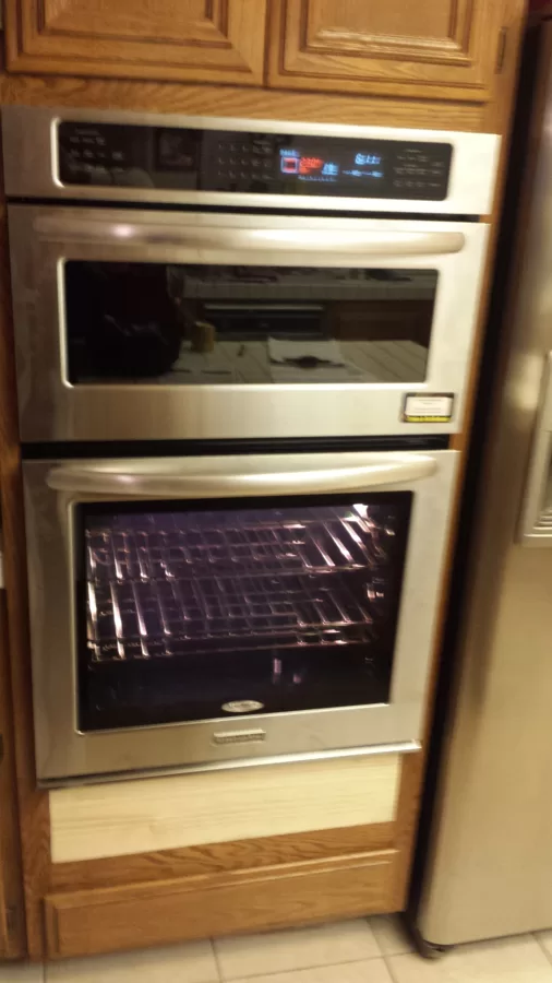 Double oven platform raise about 6inches total cost oven install and platform $200.