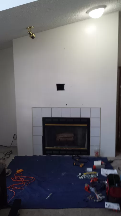 Before Tv mount and wire conceal.